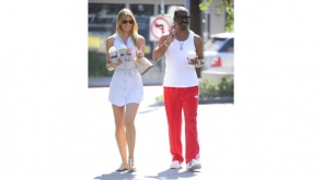 Eddie Murphy and Paige Butcher. Image Source:Flickr